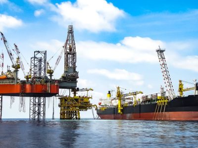 Jack,Up,Drilling,Rig,On,Production,Platform,With,Fpso,On