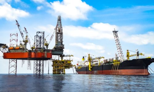 Jack,Up,Drilling,Rig,On,Production,Platform,With,Fpso,On